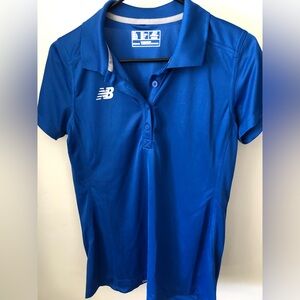 New Balance Women’s Polo.  Dri Fit Material.  Size Medium. Royal Blue.